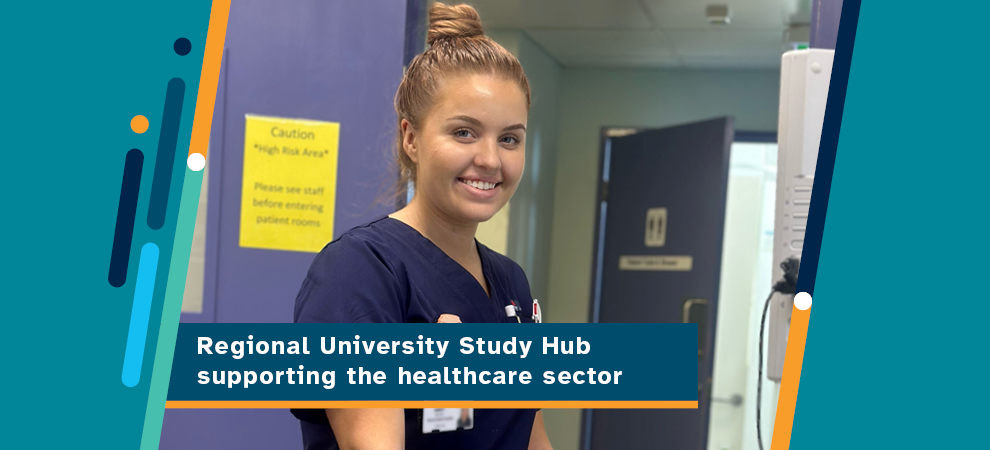 Regional University Study Hub supporting growth of local healthcare sector banner with an image of a female nurse wearing scrubs, with blonde hair in a bun, in a hospital, smiling at the camera.